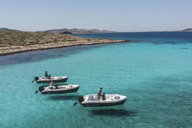 Cruise around the stunning coastline of Paros on a private boat