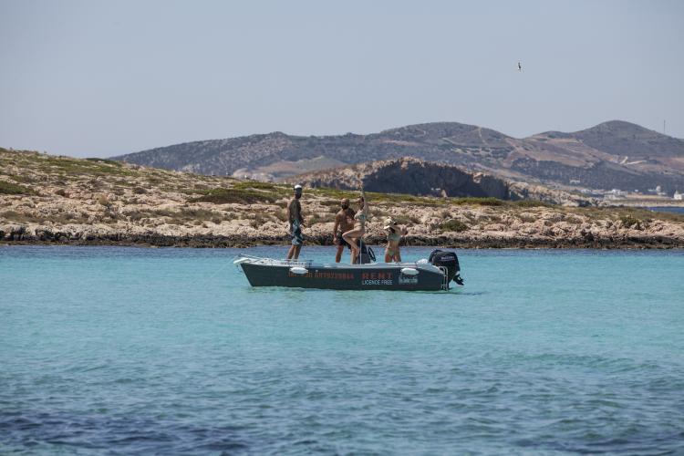 Escape to paradise with our boat rental service in Paros