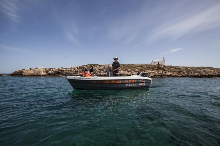 Discover hidden coves and secluded beaches with our boat rental in Paros