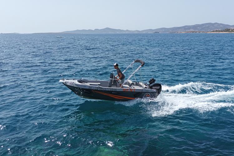 Experience Paros' coastline by boat - a must-do activity